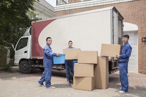 Moving van and packed boxes for a Colliers Wood relocation