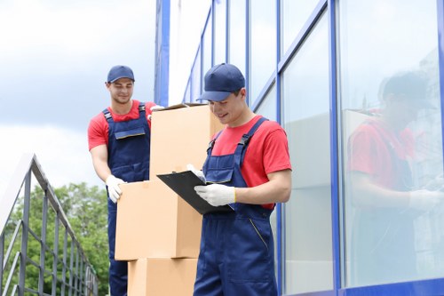 Man and van team preparing items safely for loading