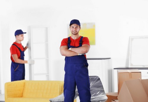Man and van moving boxes and furniture in Colliers Wood