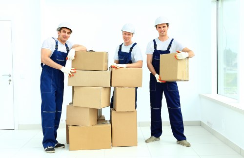 Professional team handling office furniture during a Colliers Wood relocation