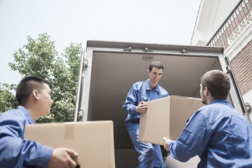 Staff training in safe lifting and moving techniques during removals