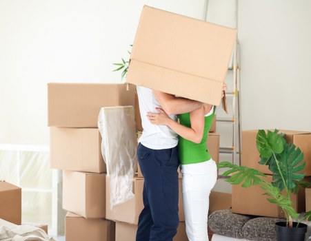 Colliers Wood removals team handling furniture and boxes