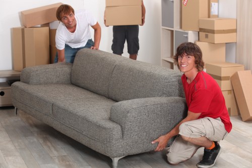 Boxes and wrapped furniture prepared for a Colliers Wood home move